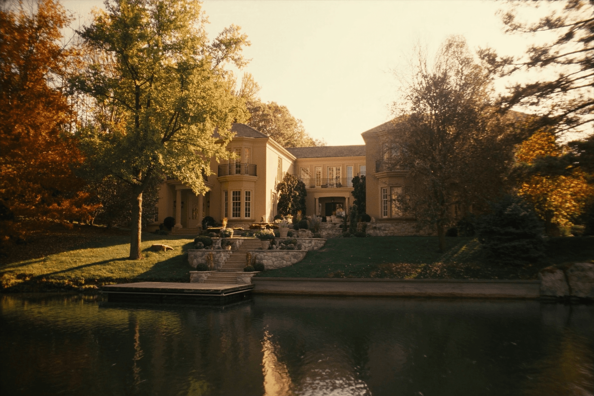 A refined lakeside estate in Wisconsin lake country at golden hour